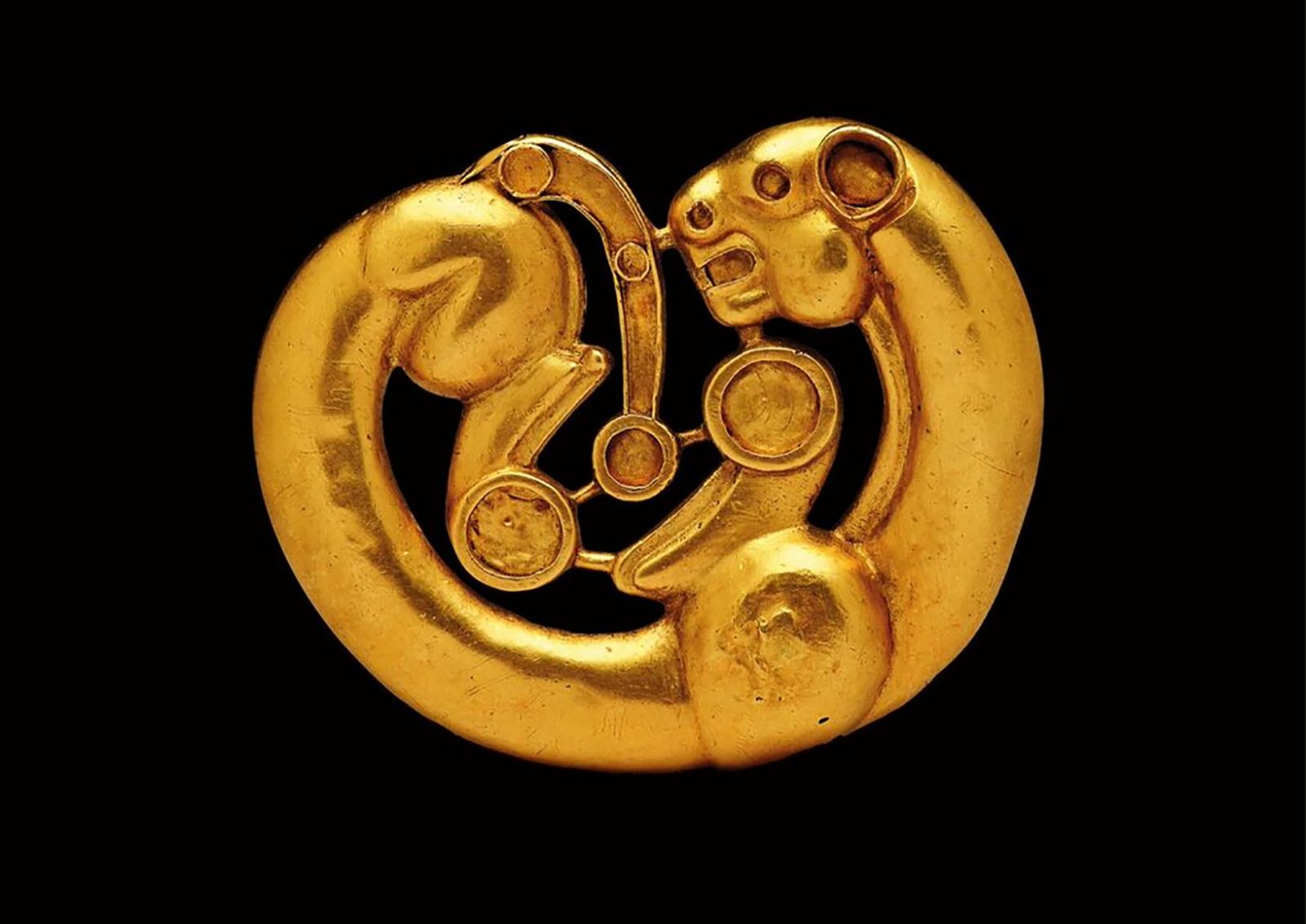 Fig. 4. Gold plaque in the shape of a coiled panther, fourth–third century B.C.E. Siberian Collection of Peter the Great (V. Terebenin; © The State Hermitage Museum, St. Petersburg, 2017).